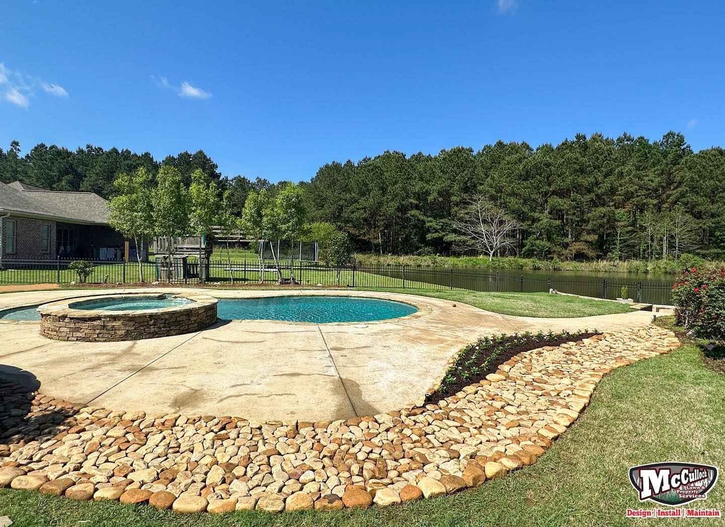 residential rock walkway around the pool