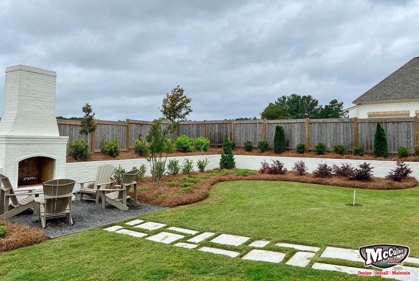 concrete masonry walkway to firepit of residential firepit